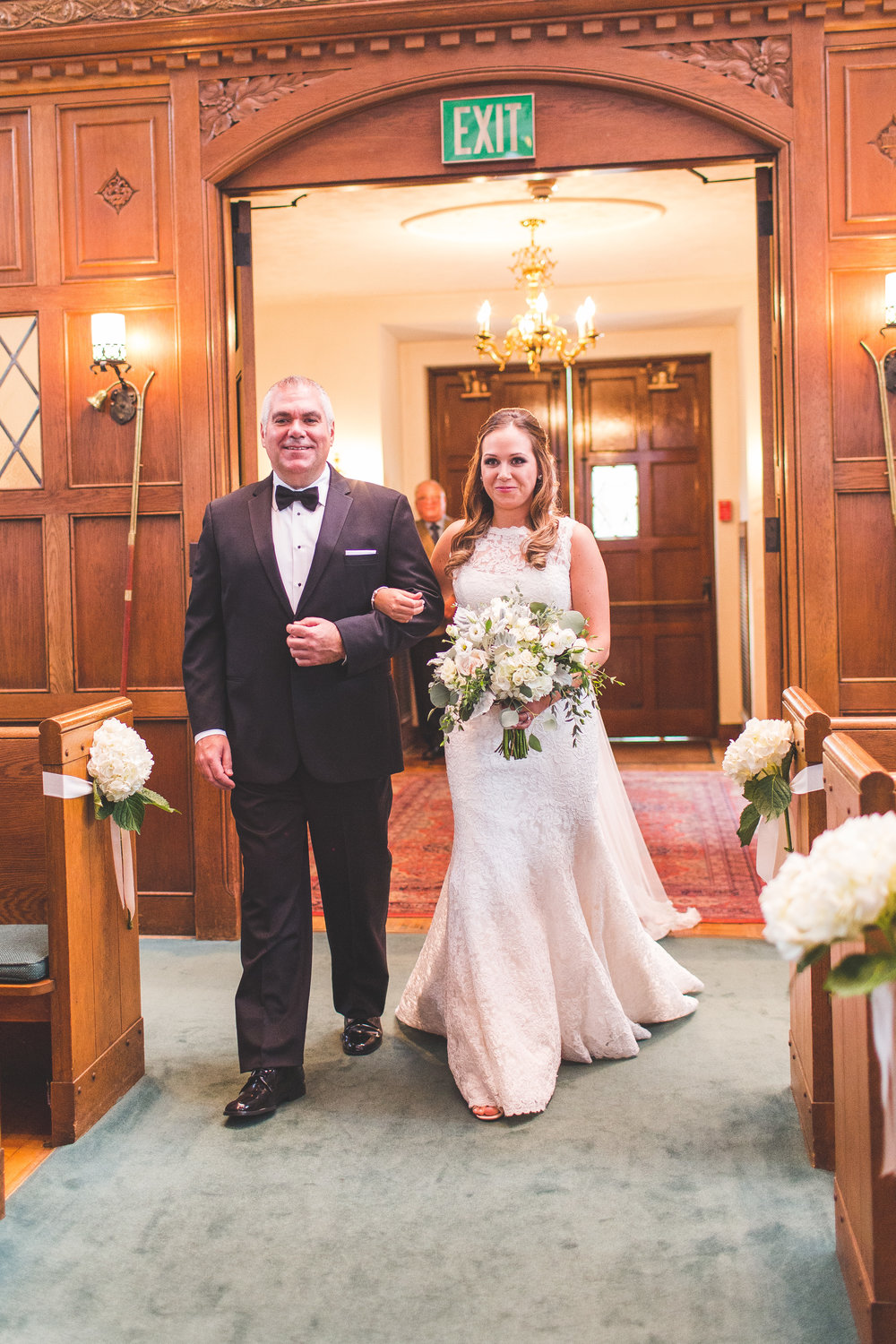 Father and bride isle walk traditional church