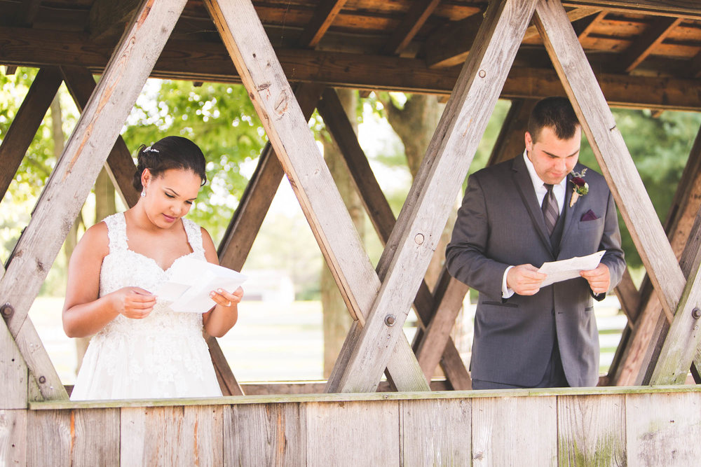 couple reading love notes on wedding day lithoplis ohio