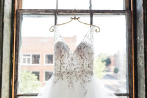 bride dress hanging from window in circleville ohio