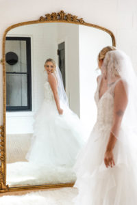 bride looking in mirror wedding photography in circleville ohio