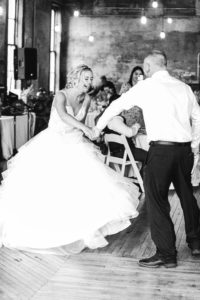groom spinning bride during first dance wedding photography in circleville ohio