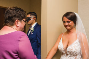 sam and grace photography winery wedding blind first look and prayer