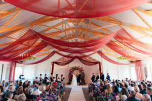 Gorgeous flora and field wedding ceremony photographer and videographer