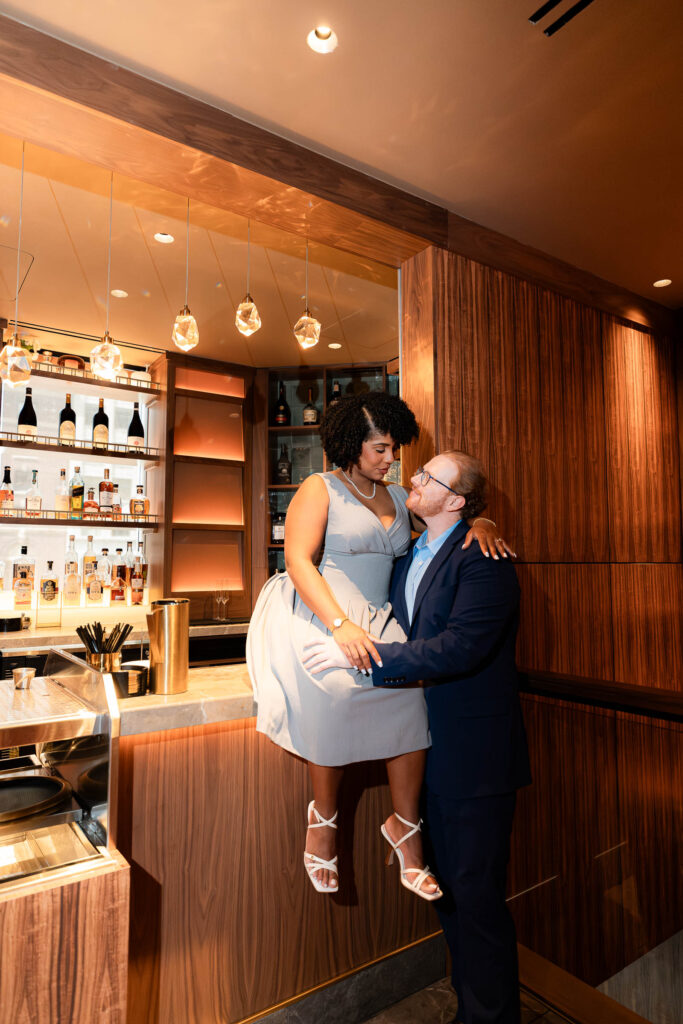 engagement session on a bar